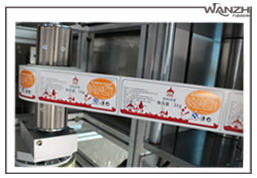 多標頭卷膜貼標機_自動卷膜貼標機機_萬志自動化